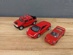 lot 94 image: Lot of 3 Die Cast Red Model Cars GM Hummer, Lamborghini Gallardo, Ferrari F40 by Kinsmart and BBurago E
