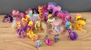 lot 123 image: Assortment of Kids Toys My Little Pony with Little Guys and Palace Pets E
