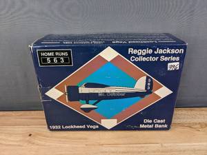 lot 47 image: 1932 Lockheed Vega Vintage Airplane Die Cast Metal Bank B