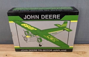lot 12 image: Brand New Limited Edition John Deere Tri Motor Model Airplane Bank B
