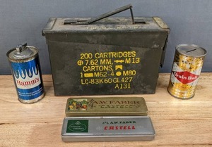 lot 92B image: Vintage Military Ammo Box, Grain Belt Beer Coin Bank, Hamms Beer Flat Top Beer Can and Two A.W. Faber Castell Pencil Boxes B
