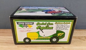 lot 54 image: Vintage John Deere Coin Bank Pedal Car Replica, 16 scare die cast metal, BMC Toys B