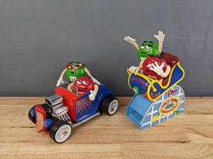 lot 139 image: Vintage M&M Wild Thing Roller Coaster Plastic Candy Dispenser & M&M Rebel Without a Clue Blue Hot Rod Candy Dispenser B