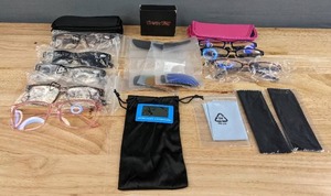 lot 145 image: Lot of (8) Reading Glasses, (5) Sunglass Lens Inserts, (8) Holders, (3) Cleaning Cloths Q