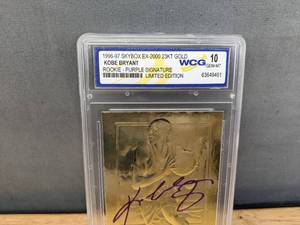 lot 25 image: 1996-97 Skybox EX-2000 23KT Gold Kobe Bryant Rookie Purple Signature WCG 10 Graded Numbered Limited Edition NBA Basketball Lakers Card V