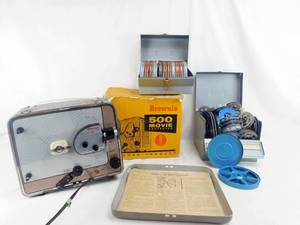 lot 43 image: Vintage Kodak Brownie 8MM Movie Projector No 189 in Original Box with 2 Boxes of Empty Bins