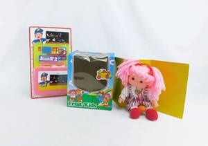 lot 91 image: Fruit Kids Doll and School Time Set