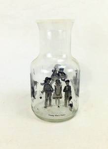 lot 96 image: Norman Rockwell Me and My Pal Covered Carafe and 4 Glasses by Libby Glassware
