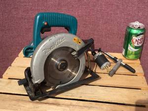 lot 115 image: Makita 5005BA Electric 5 12 Trim Saw