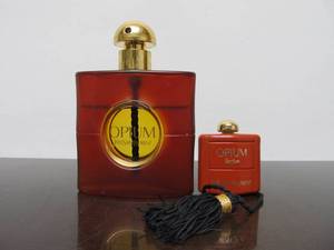 lot 105 image: Nearly Full OPIUM Perfume by Yves Saint Laurent