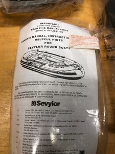 lot 171 image: Like-New or New SEVYLOR Inflatable Raft wAccessories