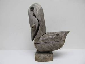 lot 146 image: Whimisical Hand Carved Wooden Pelican with Fish in Mouth Sculpture 12.5