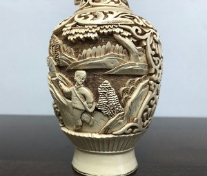 lot 239 image: Deep Relief Oriental Vase on Brass