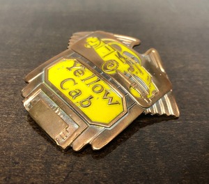 lot 274 image: Original 1930s era YELLW CAB Drivers Hat Badge