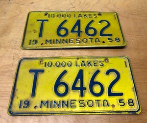 lot 284 image: Matched Pair of Vintage 1958 Yellow Embossed Metal MN License Plates