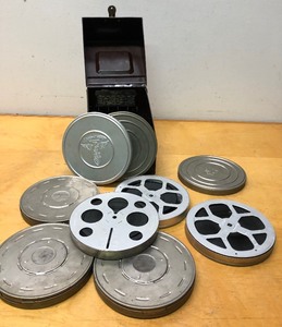 lot 377 image: Box Full of Old Vintage Films in Canisters