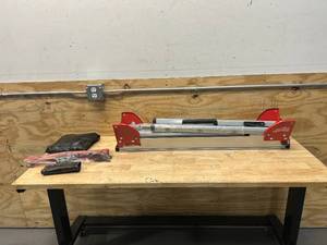 lot 33 image: MILWAUKEE Folding Miter Saw Stand