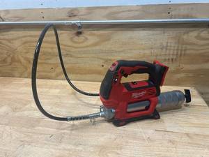 lot 13 image: MILWAUKEE M18 18V Lithium-Ion Cordless Grease Gun 2-Speed (Tool-Only)