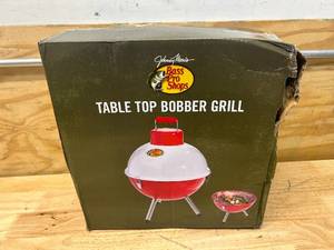 lot 130 image: BASS PRO SHOPS Table Top Bobber Grill