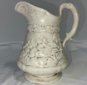 lot 74 image: The Witches Pursuit Clay Pitcher