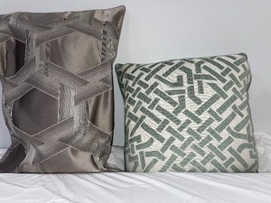 lot 100 image: Set of Two Pillows Grey Tone and Green Pattern