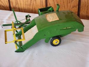 lot 15 image: Vintage Model Toy Combine - John Deere