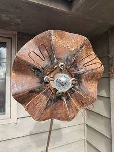 lot 1 image: Iron Reclaimed Metal Flower Garden Statue