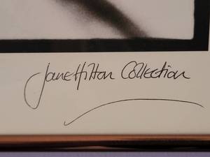 lot 64 image: Classic American Fine Art Photography Print - Jane Hilton - Freeway Kiss