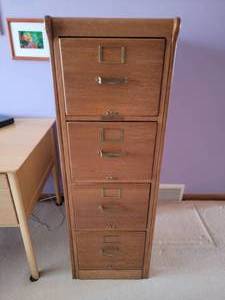lot 106 image: Classic Wood 4 Drawer Filing Cabinet - Library Bureau Sole Makers