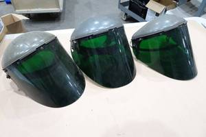 lot 241 image: Green Tinted Grinding Shields