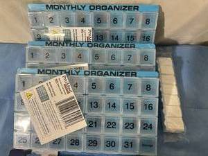 lot 119 image: Lot of Mixed NEW Monthly Weekly Pill Organizers and Coilers Elastic Shoelaces
