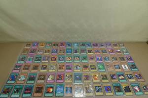 lot 32 image: Binder Pages of Yu-Gi-Oh Cards