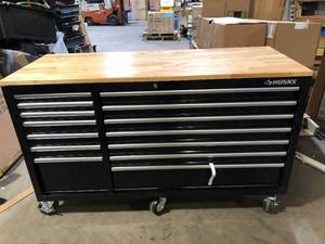 Husky 62 in. W x 24 in. D Standard Duty 14-Drawer Mobile Workbench Cabinet Tool Chest with Solid Wood Top in Gloss Black  Customer Returns See Pictures
