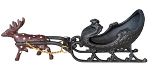 lot 47 image: Queen Mini Cast Iron Stove With Pots Pans Deer Sleigh Cast Iron Covered wagon