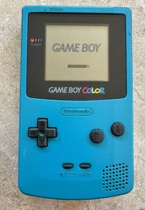 lot 54 image: Nintendo Game Boy Color Teal Model CGB-001 Handheld Game Joystick