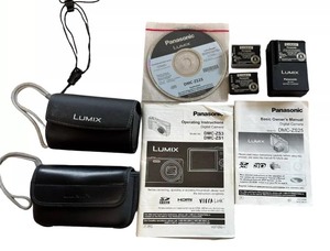 lot 101 image: Panasonic Lumix DMC-ZS25 & DMC-ZS3 Digital Cameras, Charger