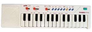 lot 113 image: Casio PT-10 Keyboard Electronic Mini Synthesizer Ivory White 29 Key Tested Works
