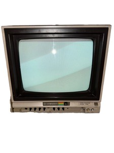 lot 129 image: COMMODORE 64 COMMODORE 154l & COMMODORE 1702 & Manuals & ADAPTORS Bundle