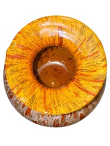 lot 44 image: Amber art glass globe-shaped vase from Murano, featuring a flat rim and fenestrated pattern.