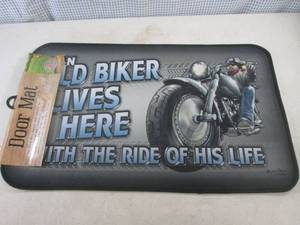 lot 217 image: (B-1) An Old Biker Lives Here...Door Mat IndoorOutdoor 30 x 17.7