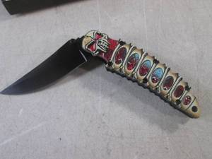 lot 221 image: (CNTR) Skull Design Spring Assist Folding Knife with Belt Clip - 8 14 Open  4 34 Closed - New In Box