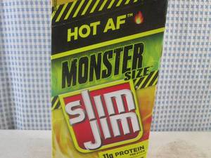 lot 232 image: (B-3) Box of 18 Monster Size Slim Jim Hot AF Smoked Snack Sticks Past Date
