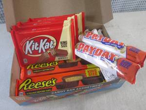 lot 322 image: (C-1) Box of 12 King Size Candy Bars 4 Each of Kit Kat, Pay Day and Reeses Peanut Butter Cups Best by Date Vary March - Aug 2024