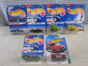 lot 386 image: (EC1) Assorted Hot Wheels in Packaging