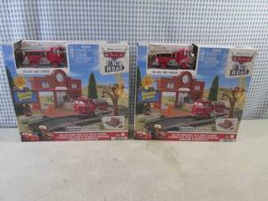 lot 67 image: (CSB) 2 Disney Pixar Cars On The Road Reds Fire Station Play Sets