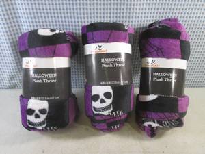 lot 73 image: (CS) 3 Halloween Plush Throws 48 x 58