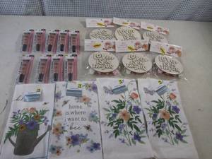 lot 84 image: (CSB) 9 LA Colors Moisturizing Lipgloss, 6 Love Is In The Air Wall Decor and 4 Kitchen Towels