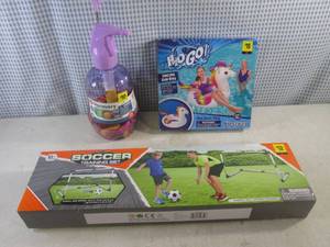 lot 94 image: (F-3) Balloon Pump with Balloons, Unicorn Swim Ring and Socker Training Set