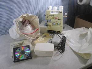 lot 117 image: (EC1) Toyota 6600 3&amp4 Thread Overlock Sewing Machine with Accessories - Untested
