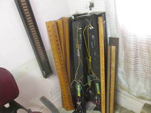 lot 35 image: (LBDR) Vintage Time Clock Card Holder, 4 Light Fixtures, Unknown Wood Pieces and Yard Sticks